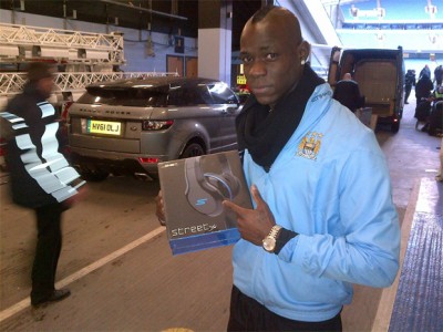 Mario Balotelli of Manchester City with Street by 50 headphones